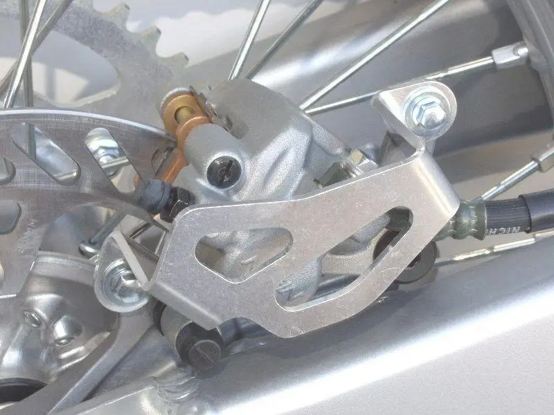 Works Connection - 25-017 - Aluminum Rear Brake Caliper Guard - Made In Usa 1